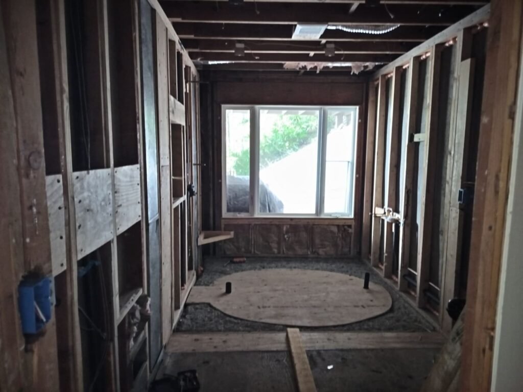 Before: Sugarloaf master bath stripped to studs