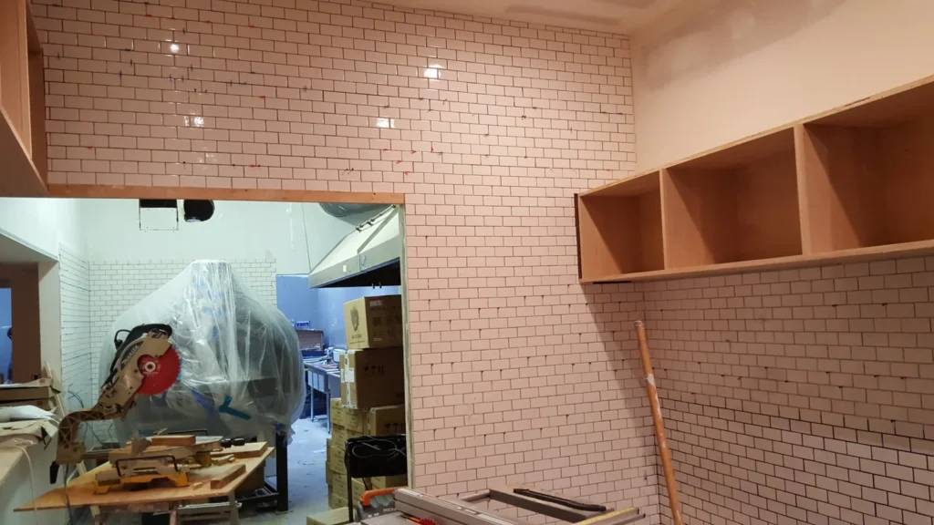 White subway tile wall installation at Fiorella Restaurant on Clement Street in San Francisco's Richmond District.